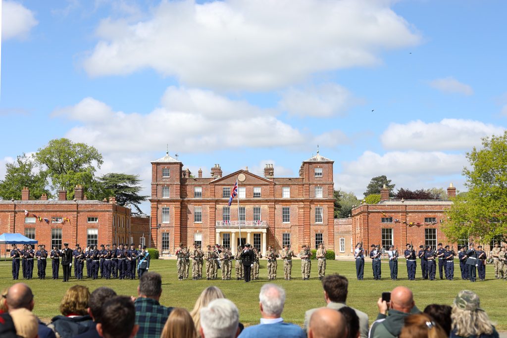 A senior-ranking military officer inspecting the school's Combined Cadet Force during the VE Day celebration at Langley Senior School.