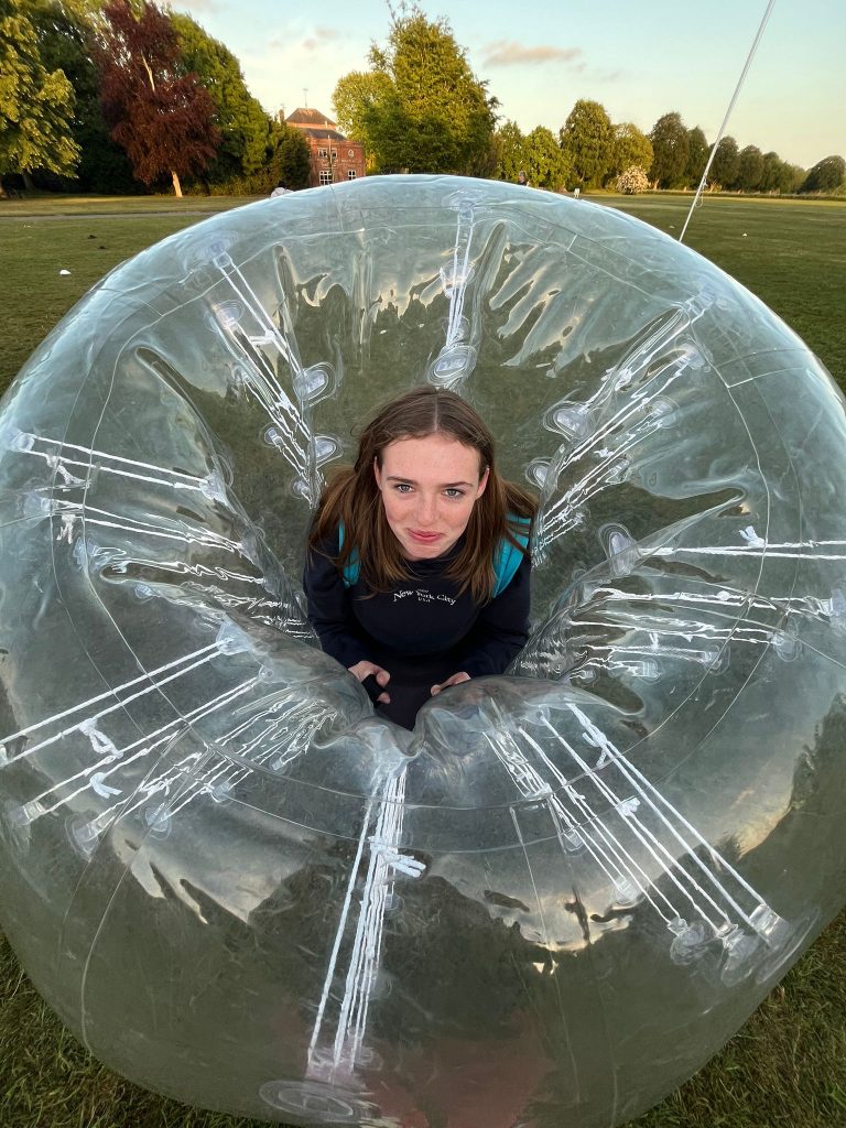 A female Langley boarder inside a Zorb ball